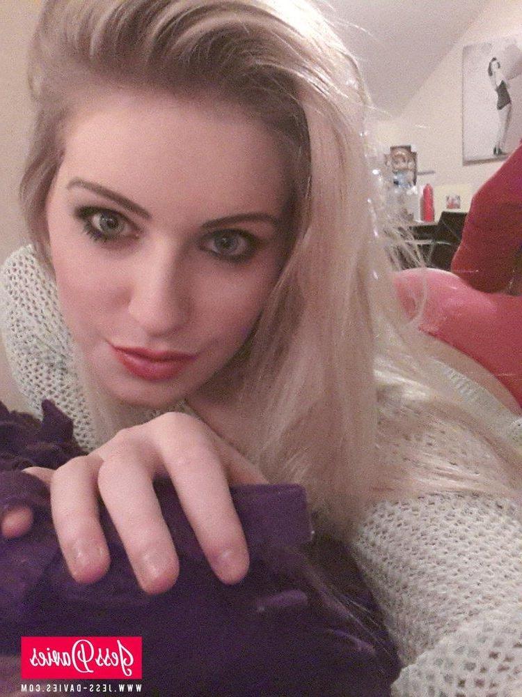 12P Jess Davies strips from her pullover to expose her nice round boobs