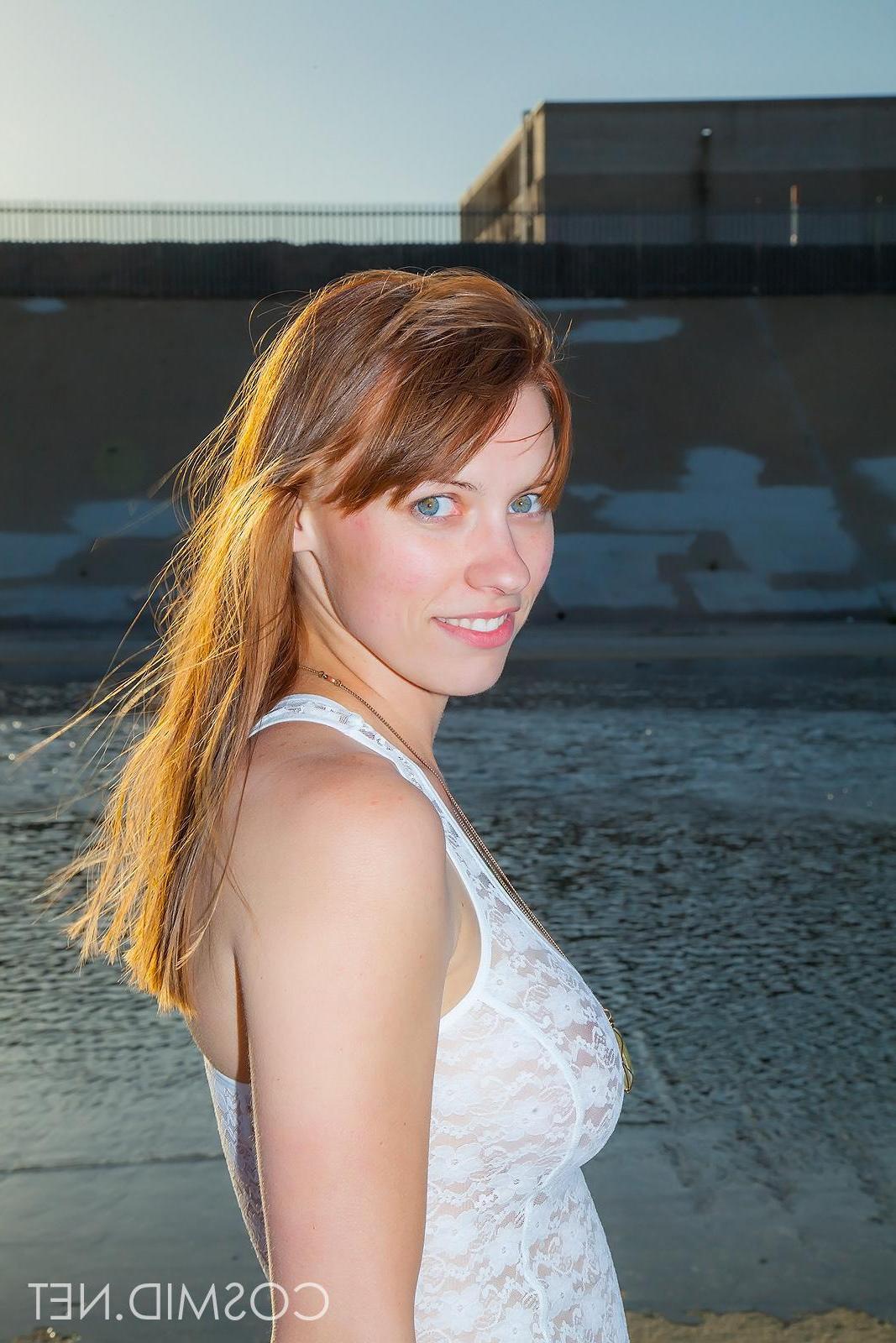 16P Busty redhead Jessica Fisher strips completely naked in the La River