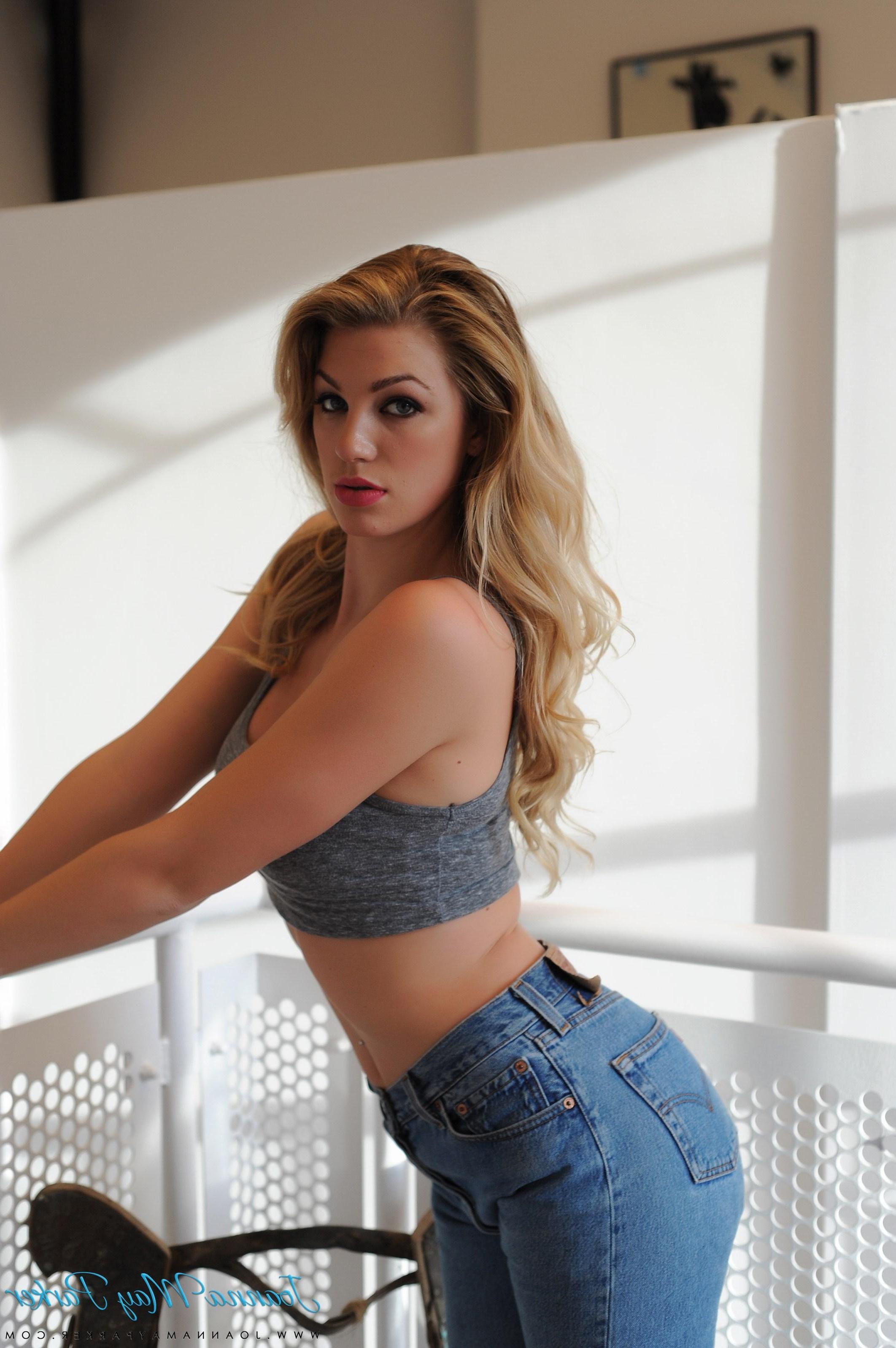 16P Blonde hottie Joanna May Parker flaunts her round boobs in sexy blue jeans