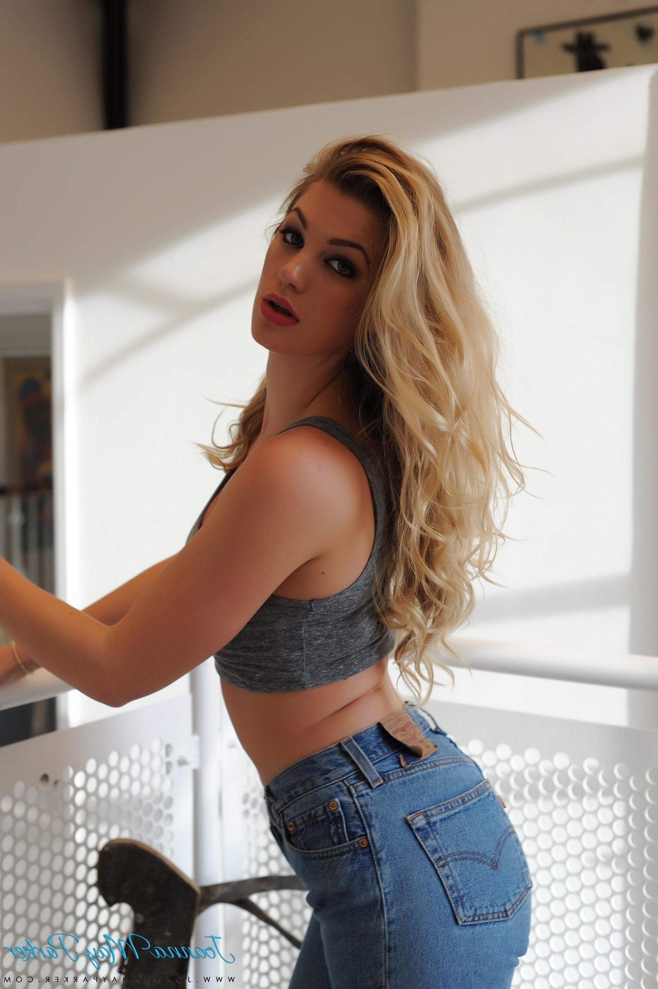 16P Blonde hottie Joanna May Parker flaunts her round boobs in sexy blue jeans
