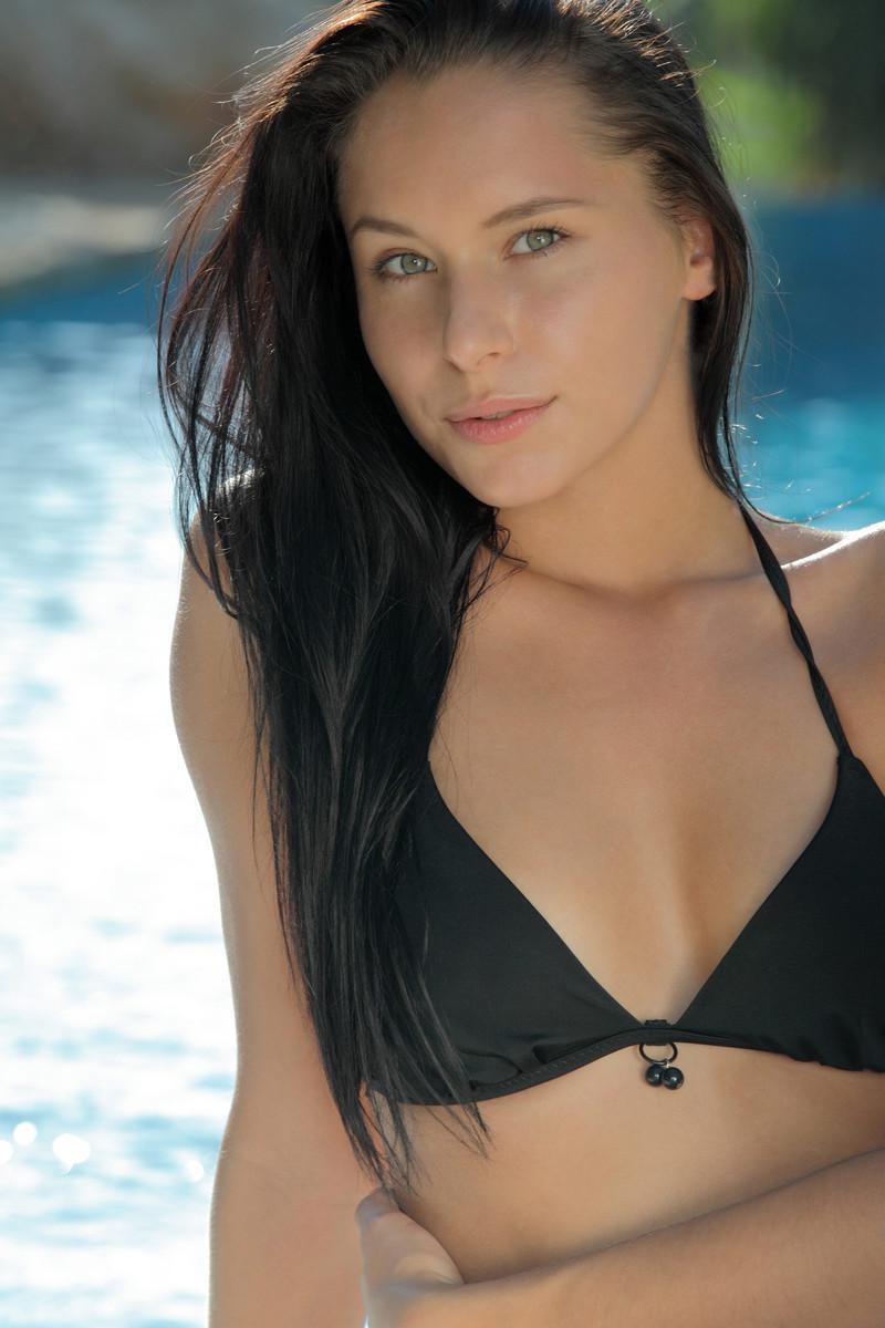 16P Pictures of stunning model Mira doing her stretches by the pool