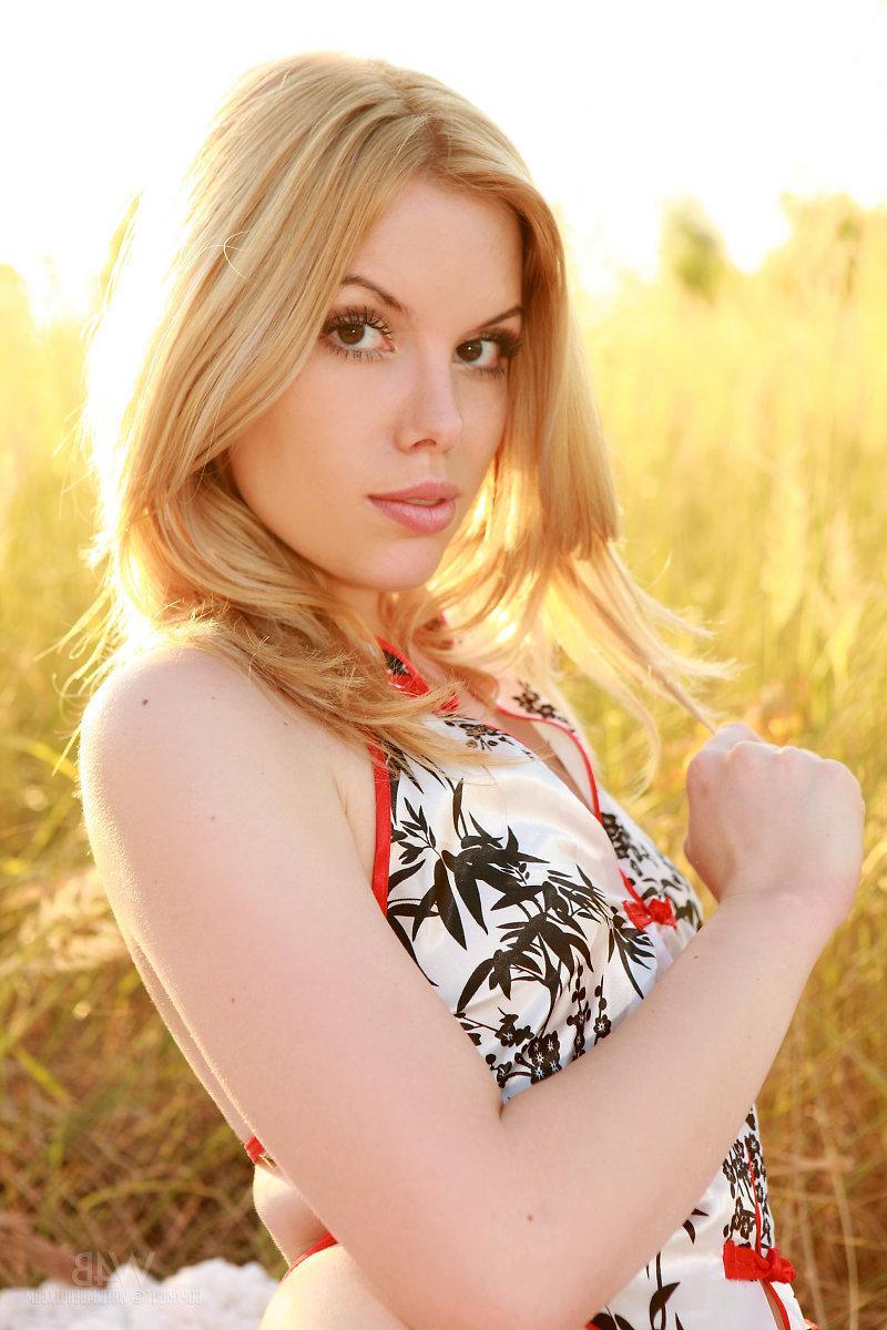 16P Beautiful blonde girl Kala Ferard gets totally naked and spreads in "Oops"