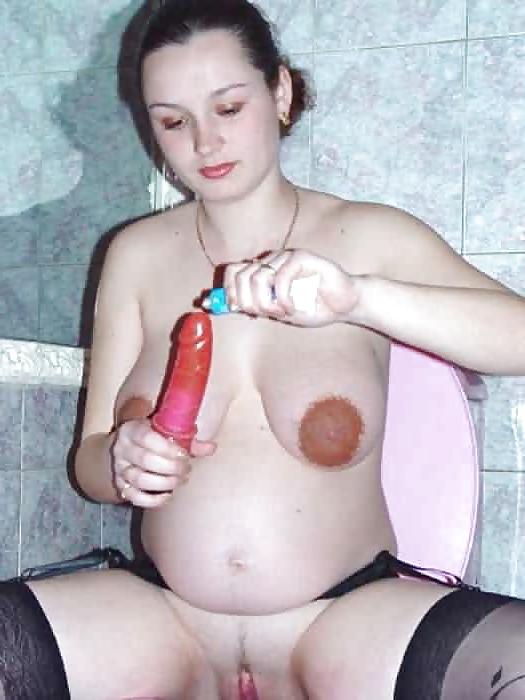 15P Lovely pregnant brunette playing with her dildo