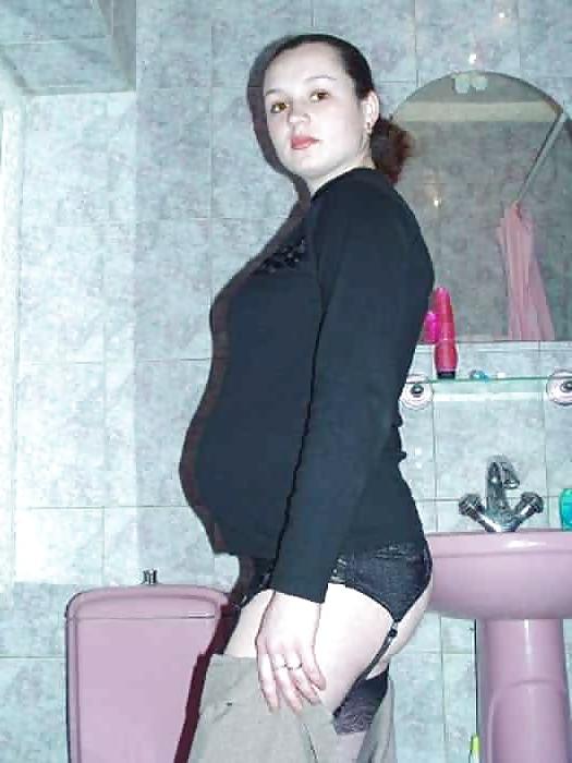 15P Lovely pregnant brunette playing with her dildo