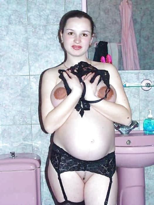 15P Lovely pregnant brunette playing with her dildo