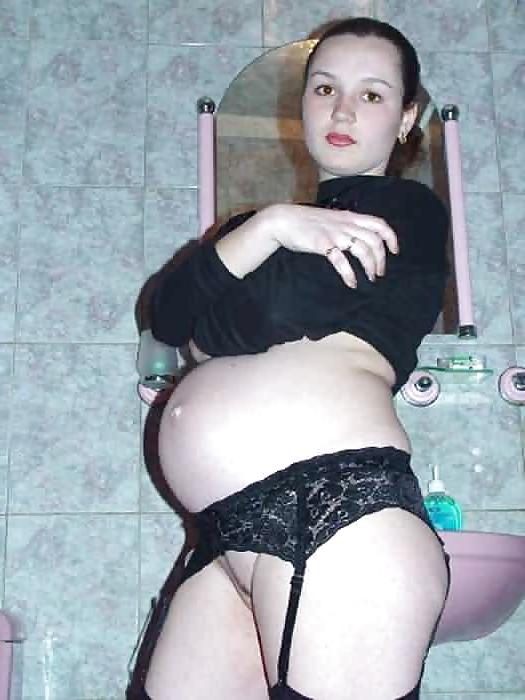 15P Lovely pregnant brunette playing with her dildo
