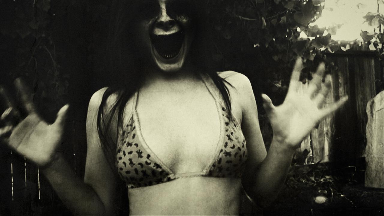 16P Brunette teen Kari Sweets teases in a cemetary for Halloween