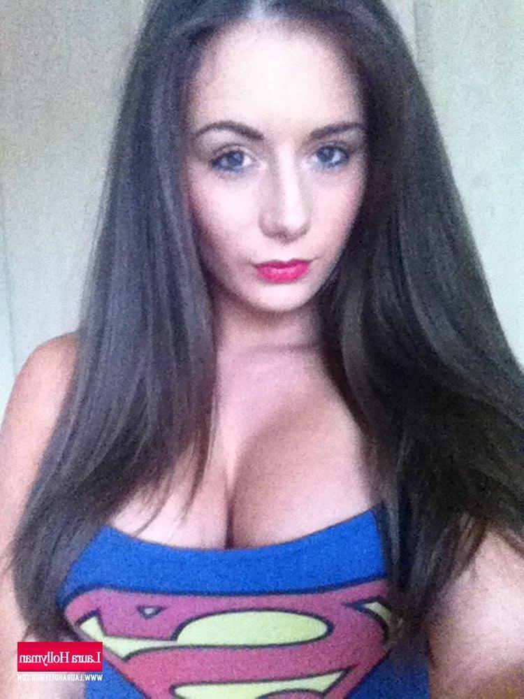 12P Laura Hollyman strips out of her sexy Supergirl top