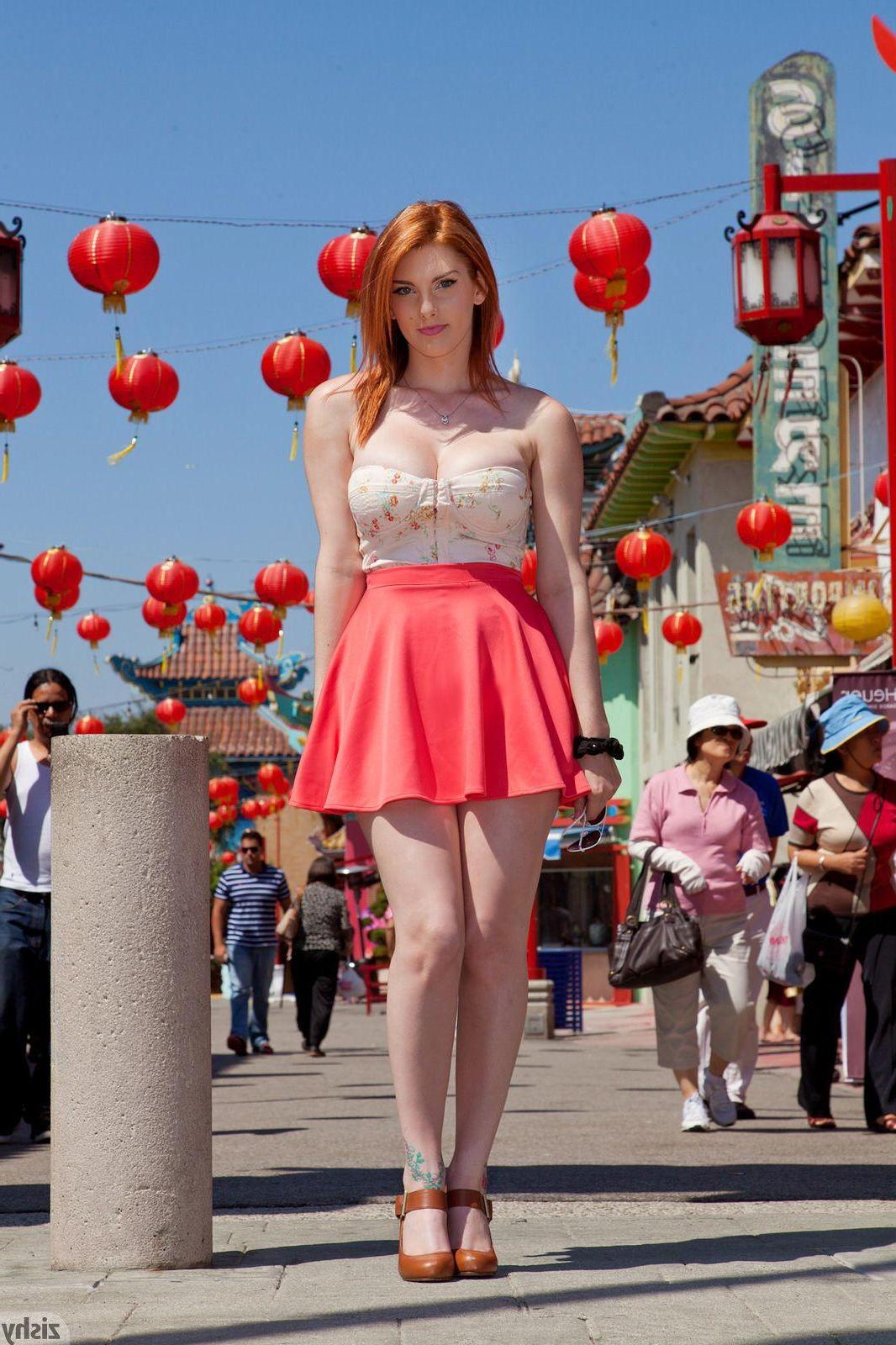 12P Redhead girl Lilith Lust shows you what's up her pretty skirt