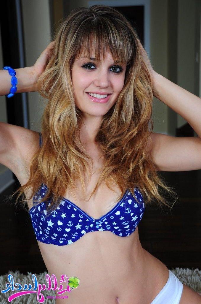 17P Pictures of Lilly Luck teasing in a blue bikini top