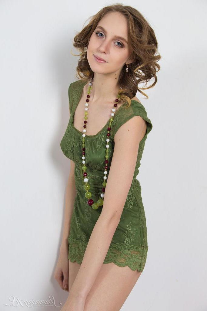 16P Brunette teen Linny strips out of her green dress for you in "Red Roses"