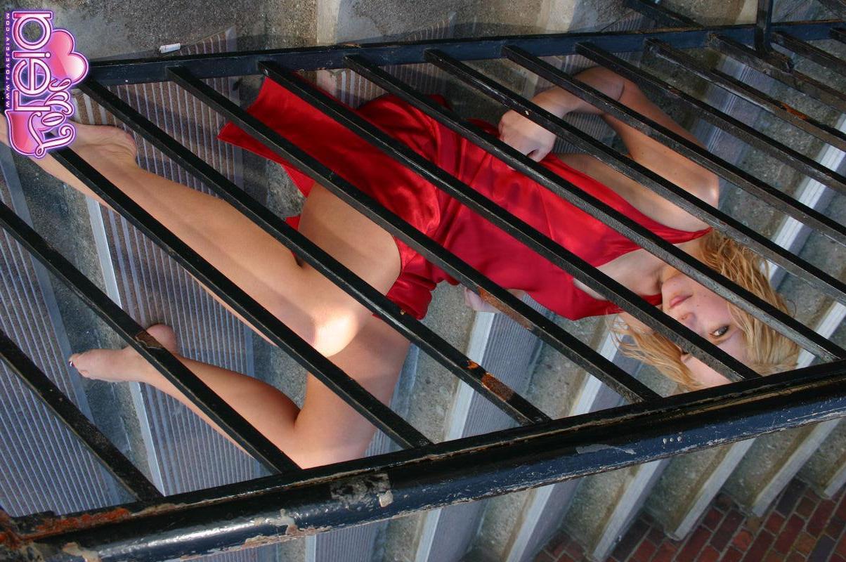 20P Pictures of teen Love Leia showing off her long legs in a red dress