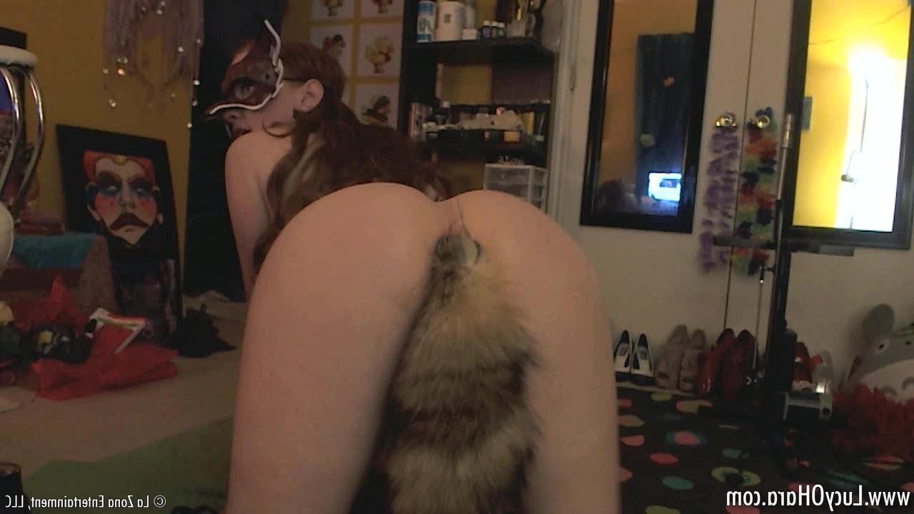 15P Lucy Ohara shows off her butt plug in her tight ass that also doubles as a fox tail