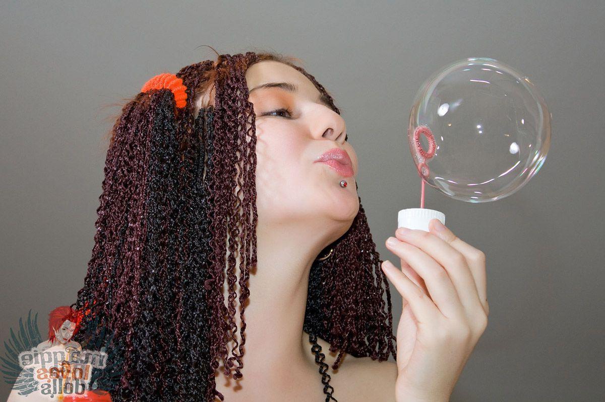 16P Pictures of teen cutie Maggie Loves Dolls showing how hard she can blow