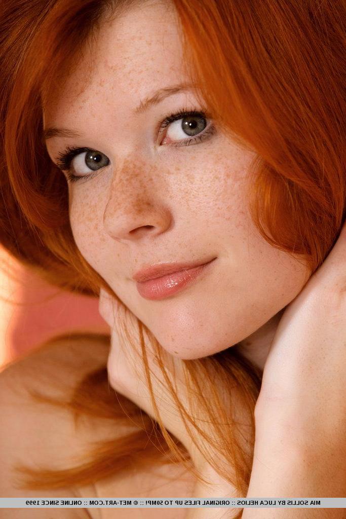 18P Pictures of teen beauty Mia Sollis giving you her tight redhead pussy