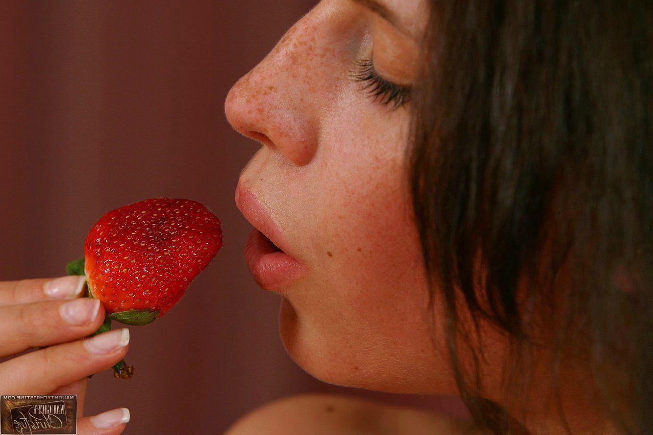 15P Pictures of Naughty Christine getting naughty with strawberries