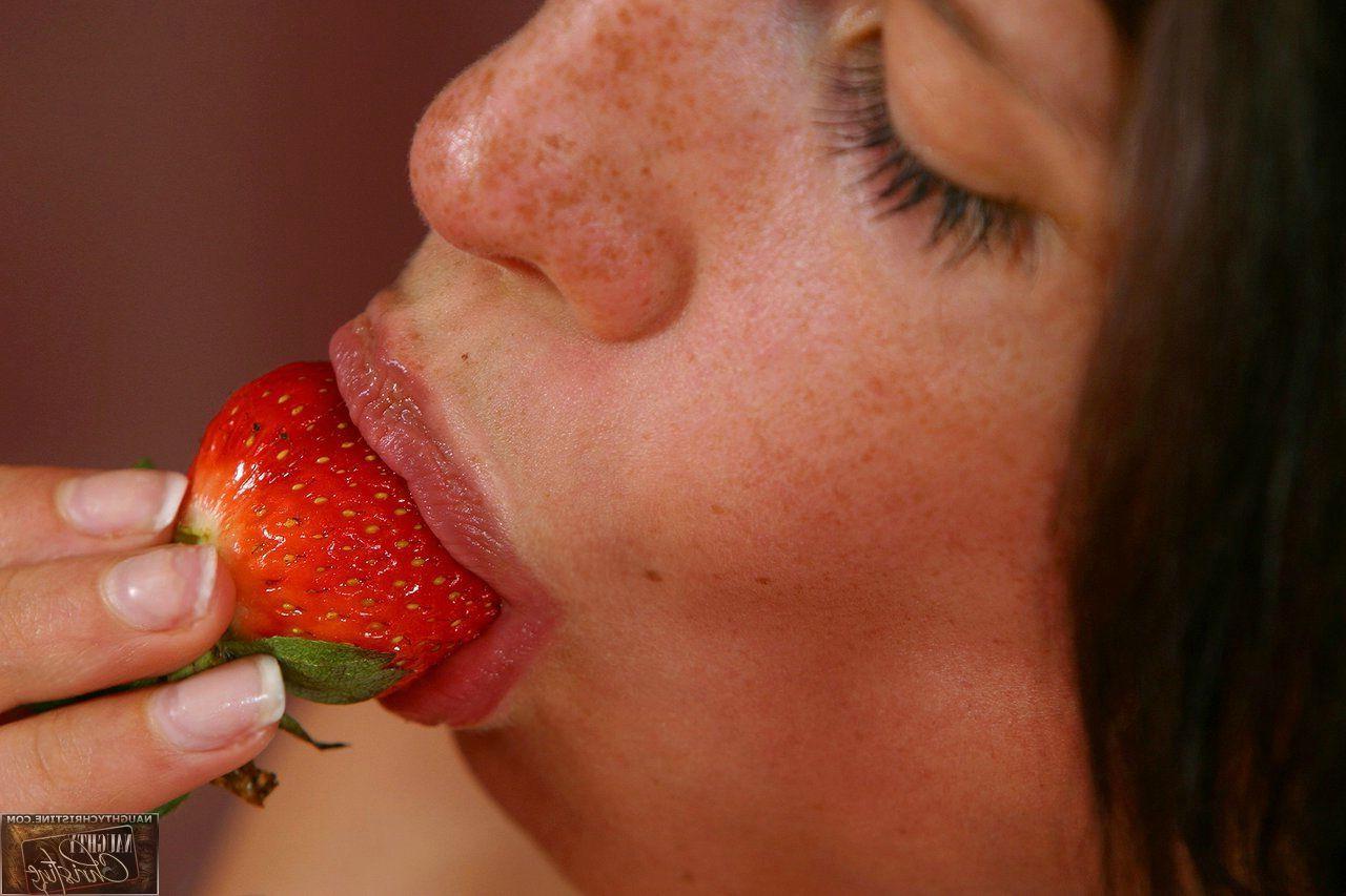 15P Pictures of Naughty Christine getting naughty with strawberries