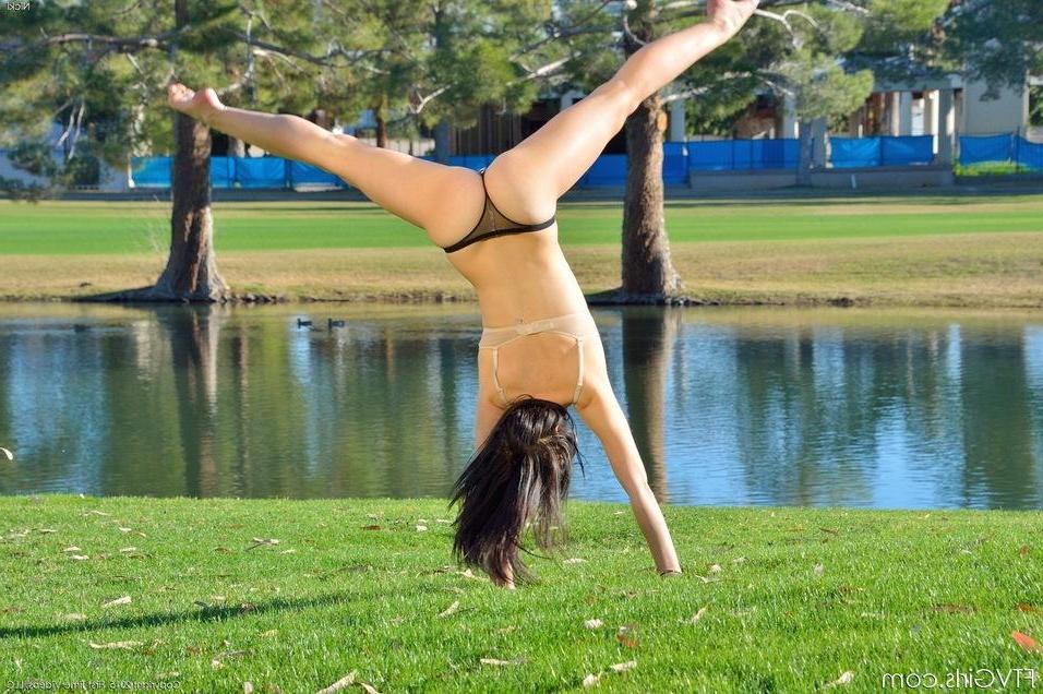 15P Brunette coed Nicki goes outside to be your playful nude acrobat