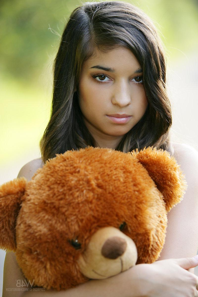 16P Brunette model Nika gives a suggestive set in public with a teddy bear