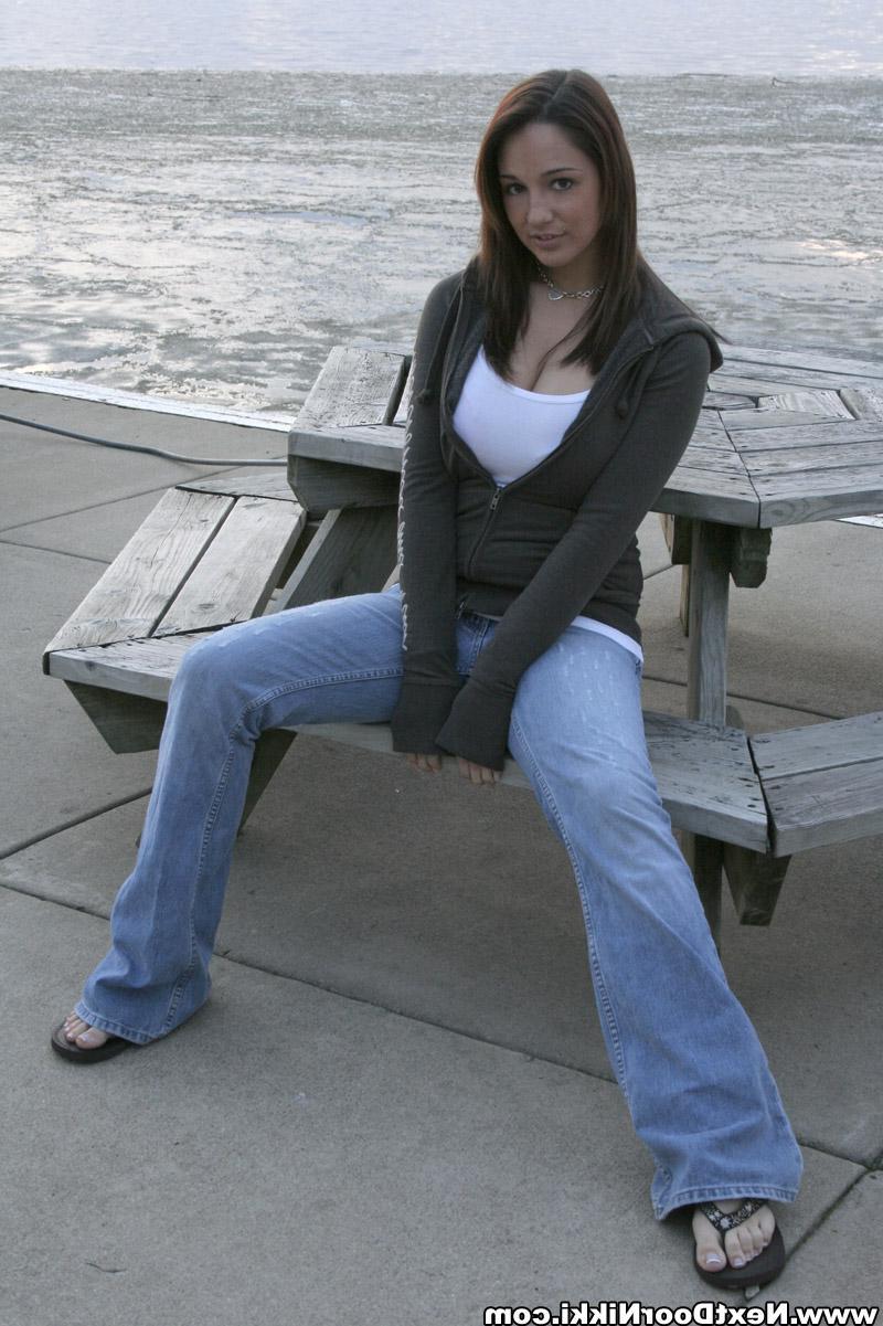 15P Next Door Nikki showing off her cleavage at the beach