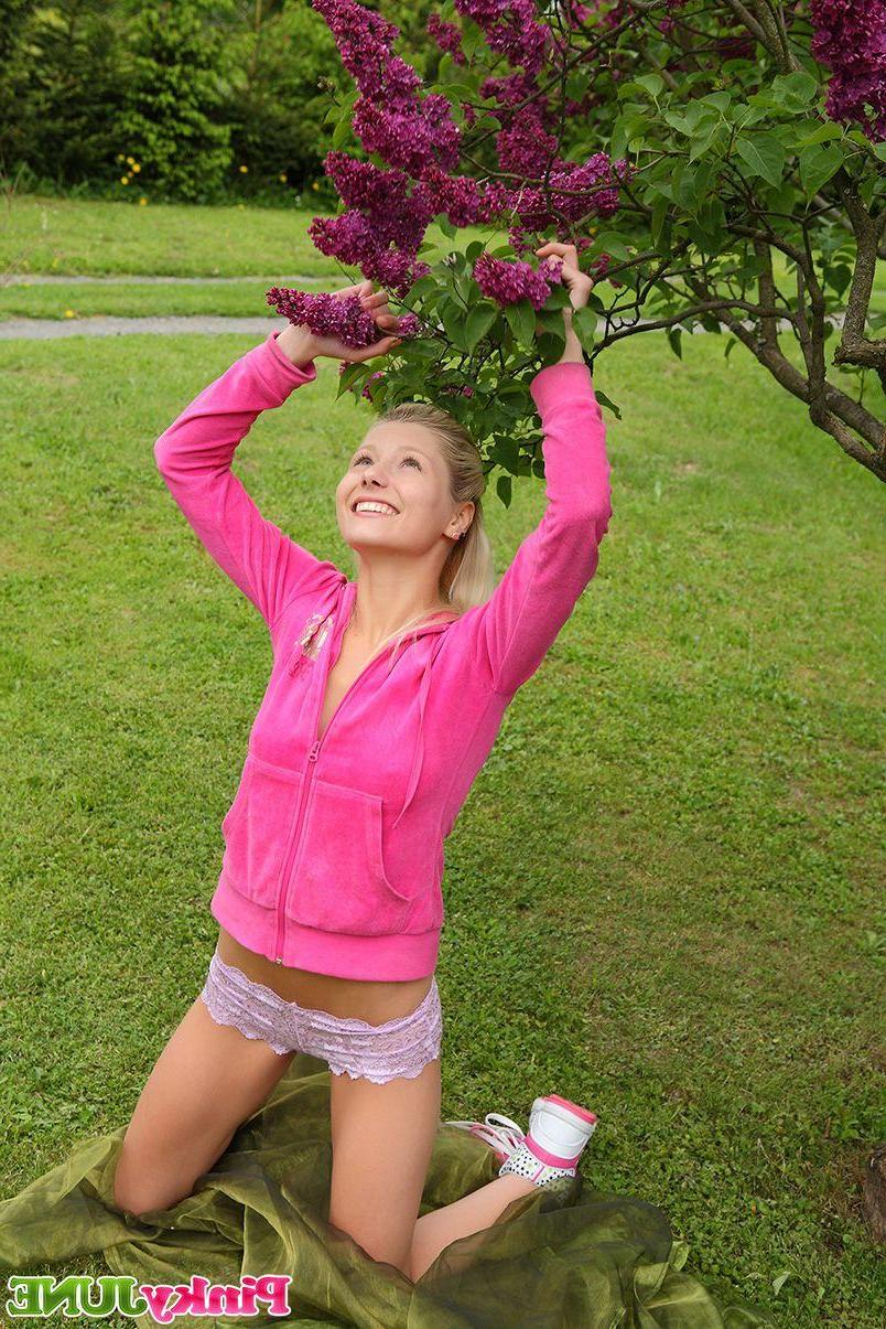 15P Pictures of Pinky June toying her pussy in the back yard