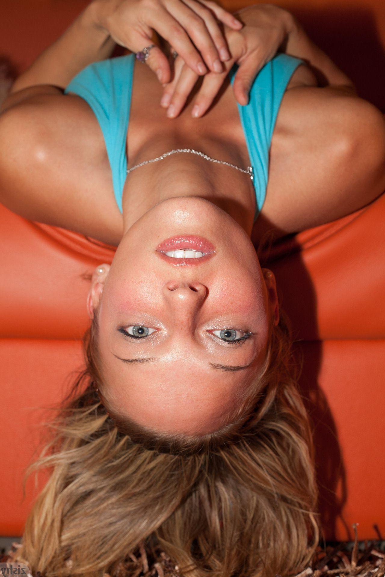 12P Blonde girl Piper Candless shows off her sexy legs in a blue one-pice