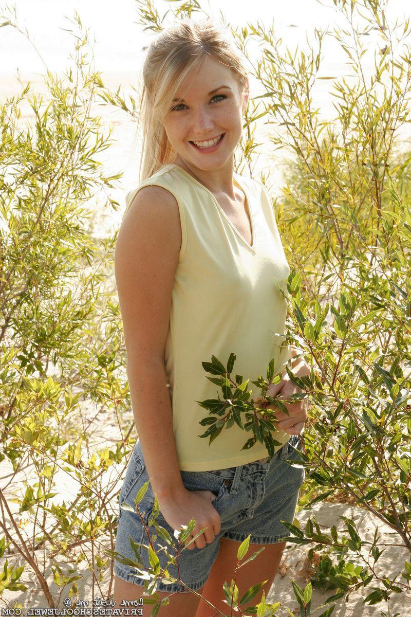 15P Pictures of teen model Private School Jewel spreading her legs on the beach
