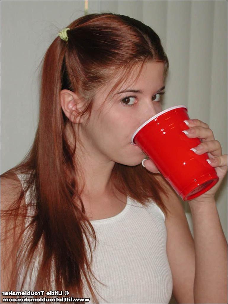 20P Pictures of teen girl Little Troublemaker getting kinky with the milk