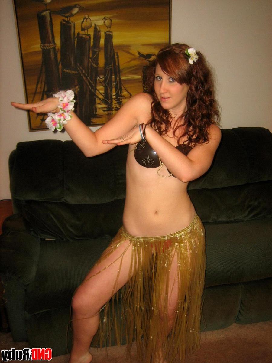 12P Redhead teen Ruby dances topless as she strips out of her hula girl costume