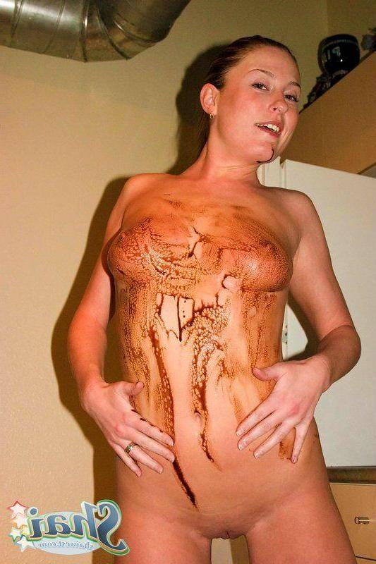 14P Pictures of teen babe Shai West being naughty with the chocolate syrup