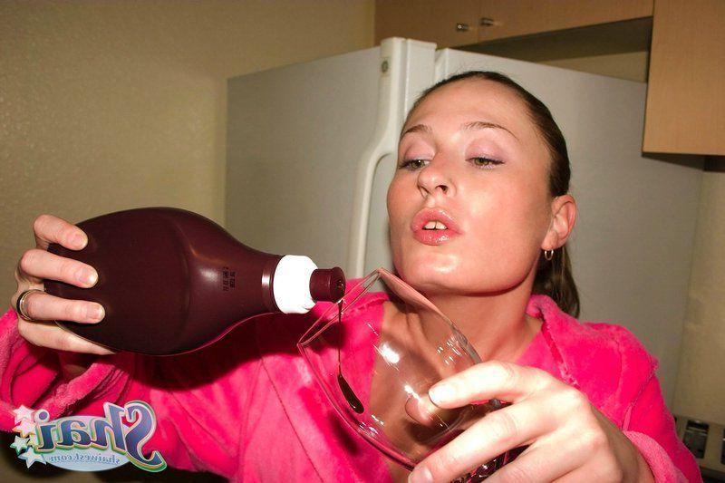 14P Pictures of teen babe Shai West being naughty with the chocolate syrup