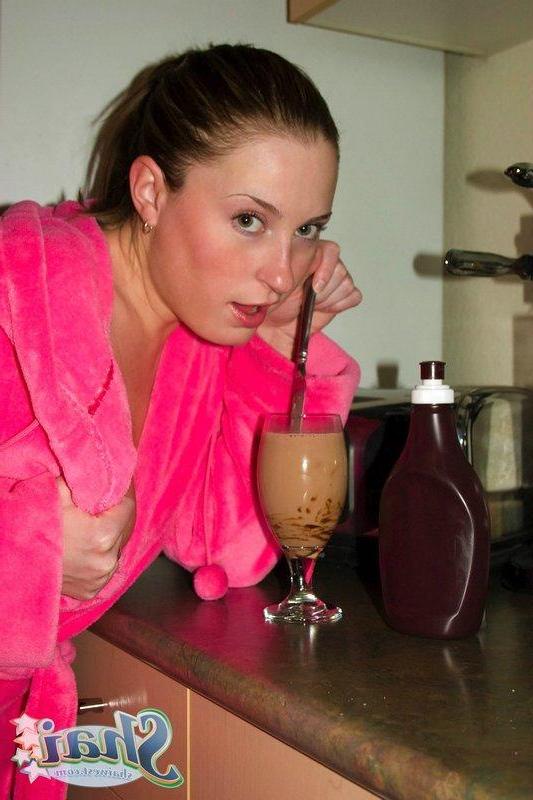 16P Pictures of teen chick Shai West making a mess with chocolate