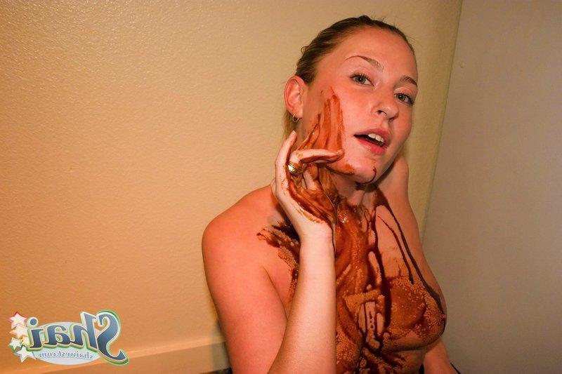 16P Pictures of teen chick Shai West making a mess with chocolate