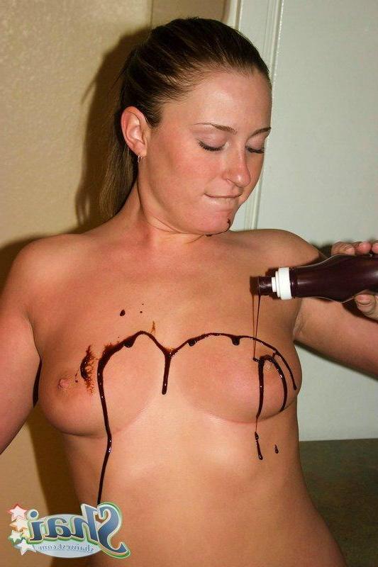 16P Pictures of teen chick Shai West making a mess with chocolate