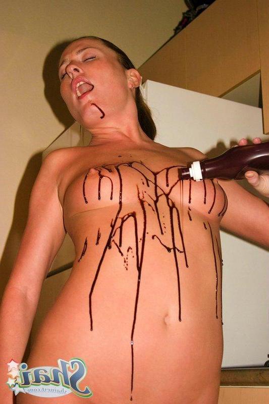 16P Pictures of teen chick Shai West making a mess with chocolate