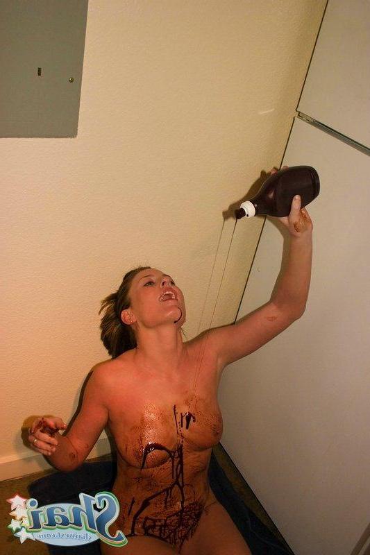 16P Pictures of teen chick Shai West making a mess with chocolate