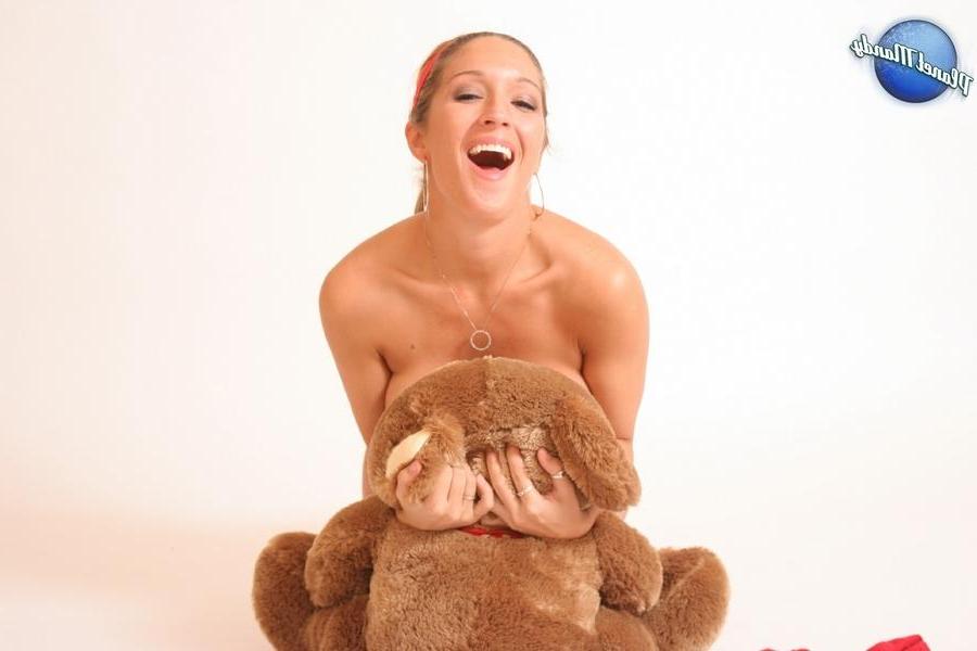 16P Pictures of Planet Mandy getting cosy with a teddy bear in the studio