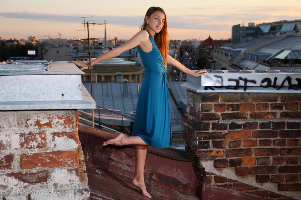 16P Pretty girl Sofy B strips naked for you on a roof top