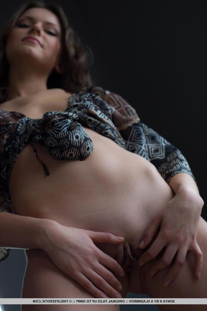 16P Sonya's pretty face and breathtaking assets instantly captures the spotlight when she cups her small but delightfully puffy nipples, and when she thrust her round and firm towards the camera.
