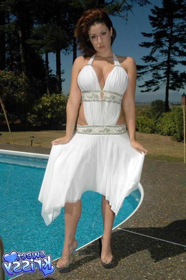 12P Busty hottie Krissy busts out of her white dress by the pool