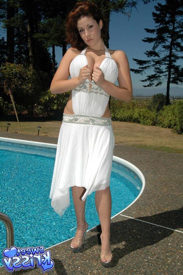 12P Busty hottie Krissy busts out of her white dress by the pool