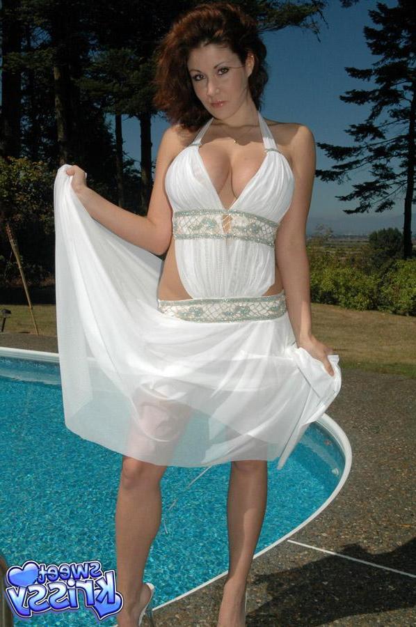 12P Busty hottie Krissy busts out of her white dress by the pool