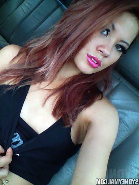 15P Sydney Mai takes some naughty pics of her touching her pussy in a truck