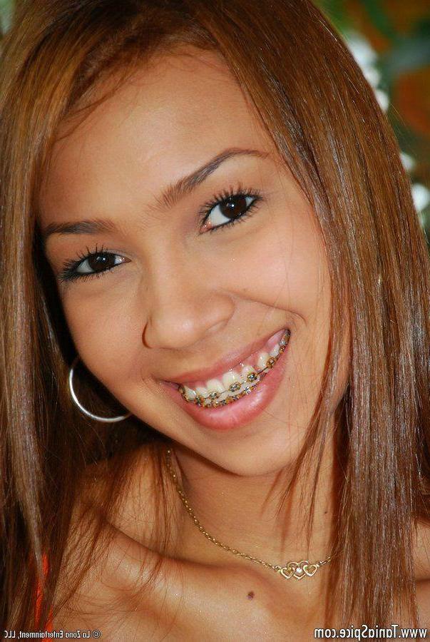 15P Pictures of teen porn girl Tania Spice toying her sweet pussy