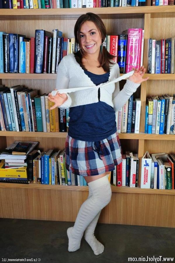 15P Pictures of schoolgirl Taylor Lain getting naughty in the library