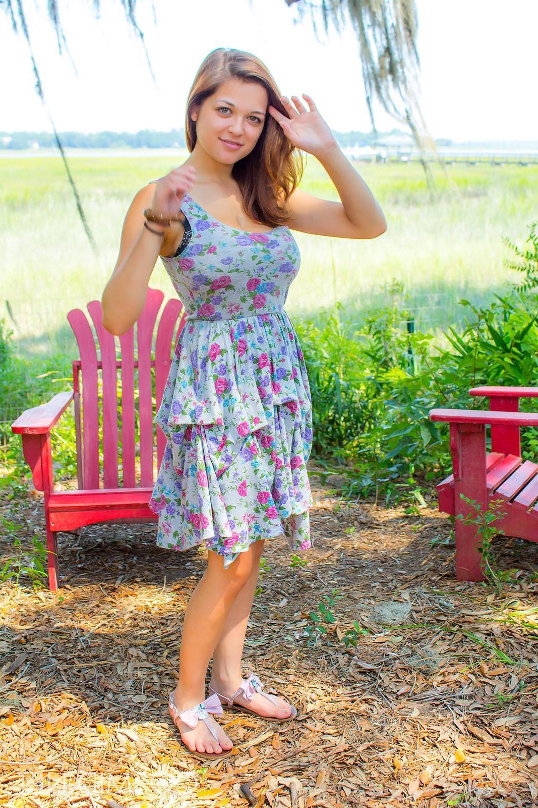16P Pictures of teen girl Tessa exposing her huge natural boobs outside