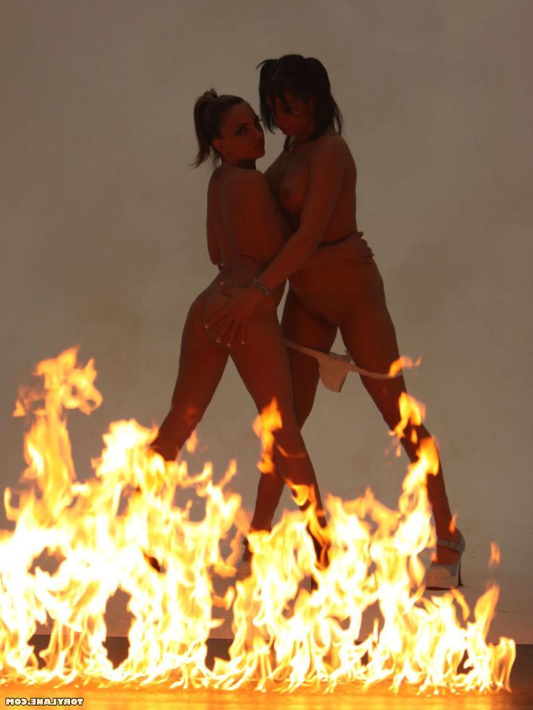 15P Tory posing with a girl and fire