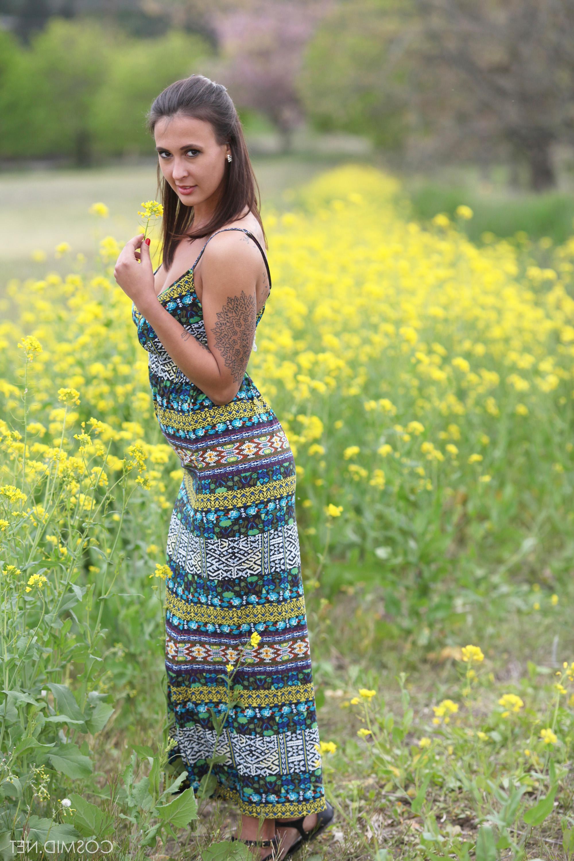 16P Busty hottie Olivia strips nude for you outside in the field