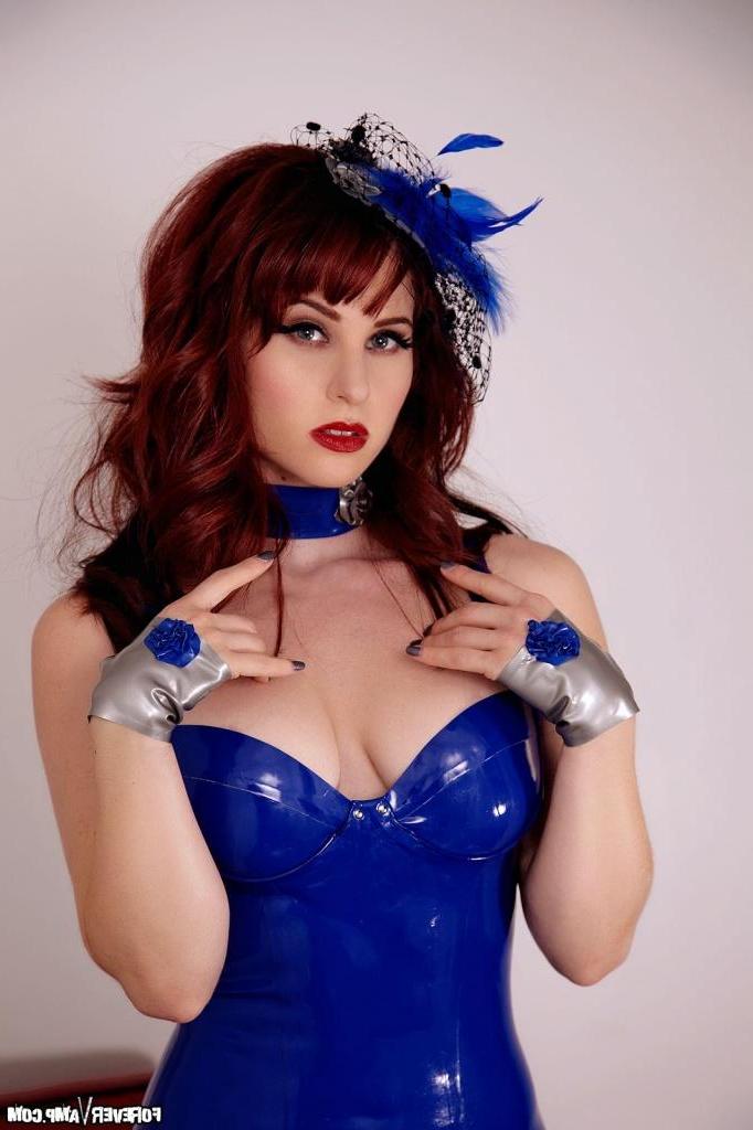 15P Pinup model Andrea looks dreamy in her tight shiny blue latex