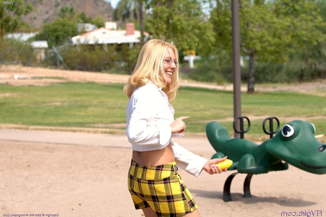 20P Pictures of a blonde schoolgirl toying her pussy in a park